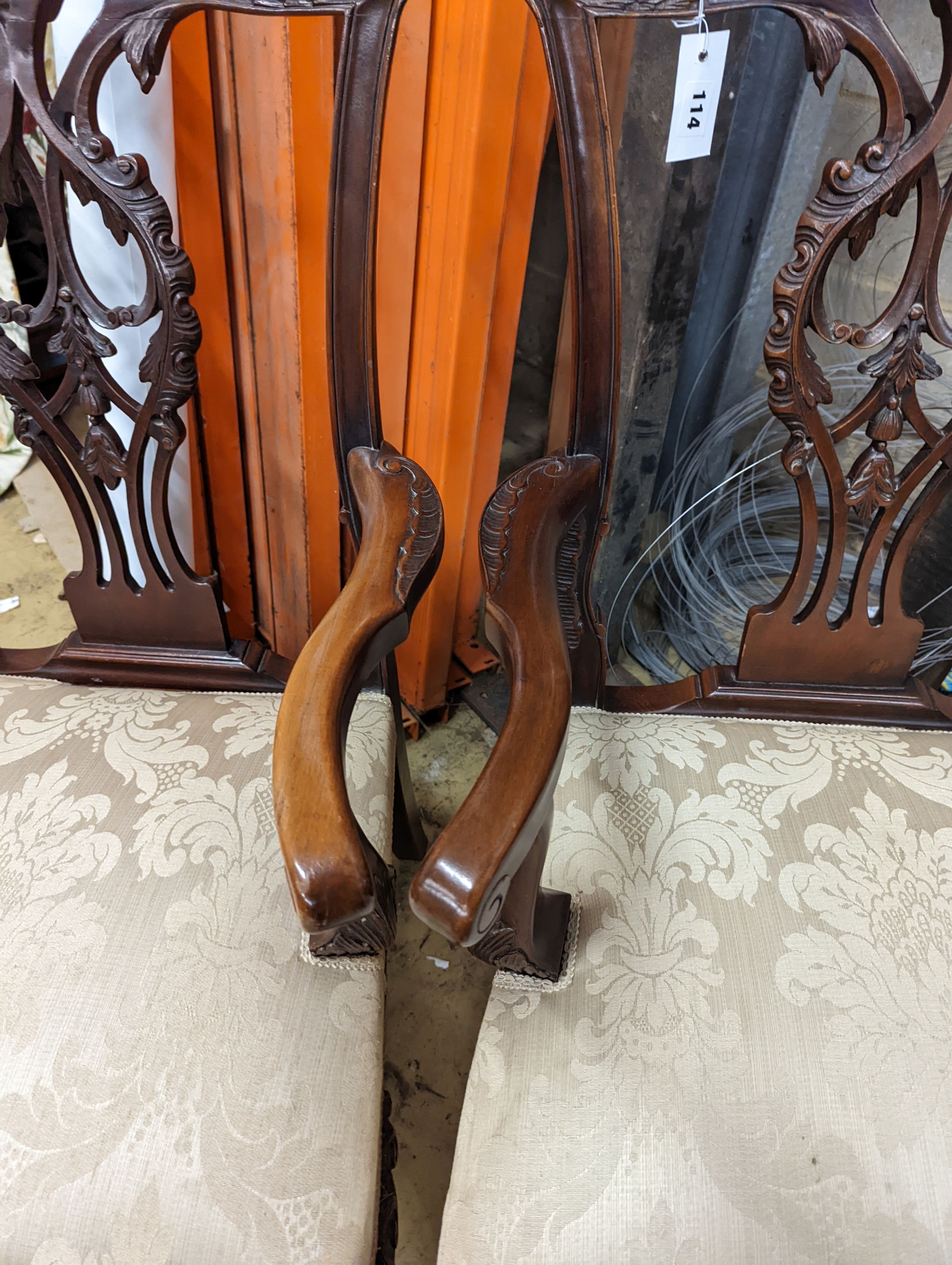 A pair of Chippendale revival mahogany elbow chairs, width 60cm, depth 50cm, height 102cm